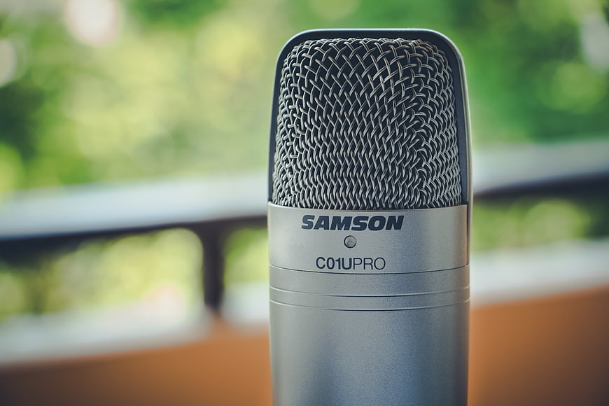 Close-up of Samson C01U Pro Microphone with Green Bokeh Background