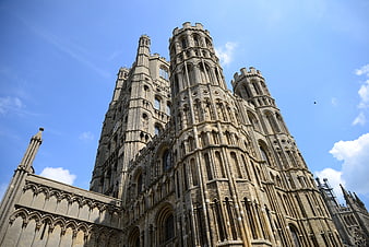 Low angle view of York Minster cathedral against blue sky