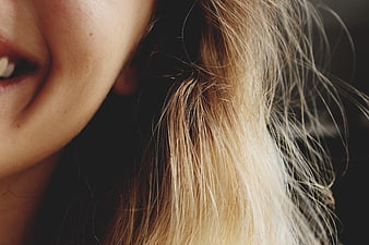 Close-up of smiling woman with blonde hair