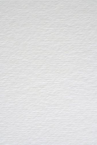 White textured paper background for design and copy space