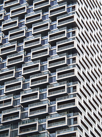 Modern Apartment Building Facade with Geometric Balcony Pattern