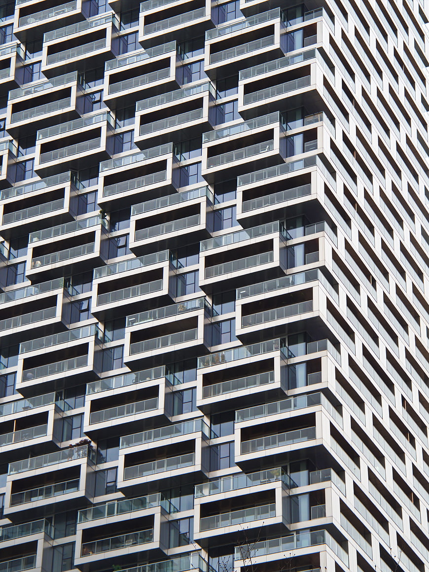 Modern Apartment Building Facade with Geometric Balcony Pattern