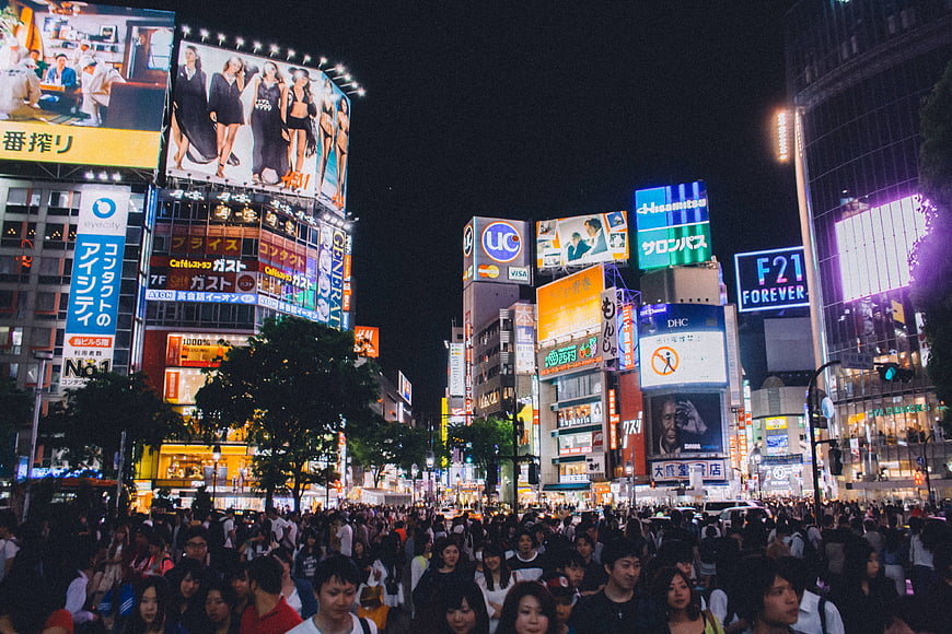 Crowded Shibuya Crossing Tokyo Night with Neon Billboards