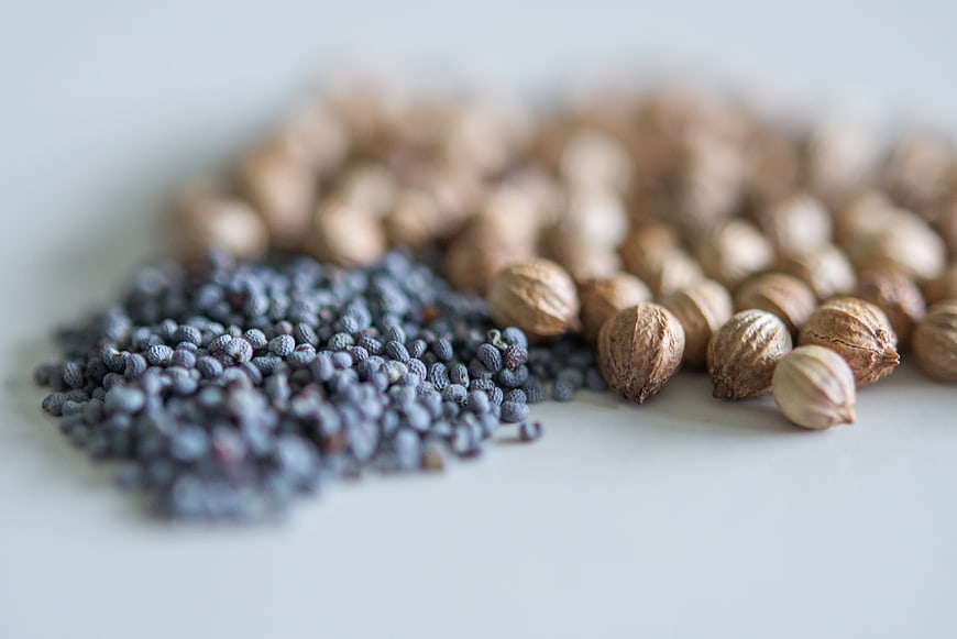 Close-up of Blue Poppy Seeds and Cardamom Pods