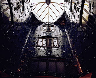 Dark Gothic Interior with Studded Walls and Skylight
