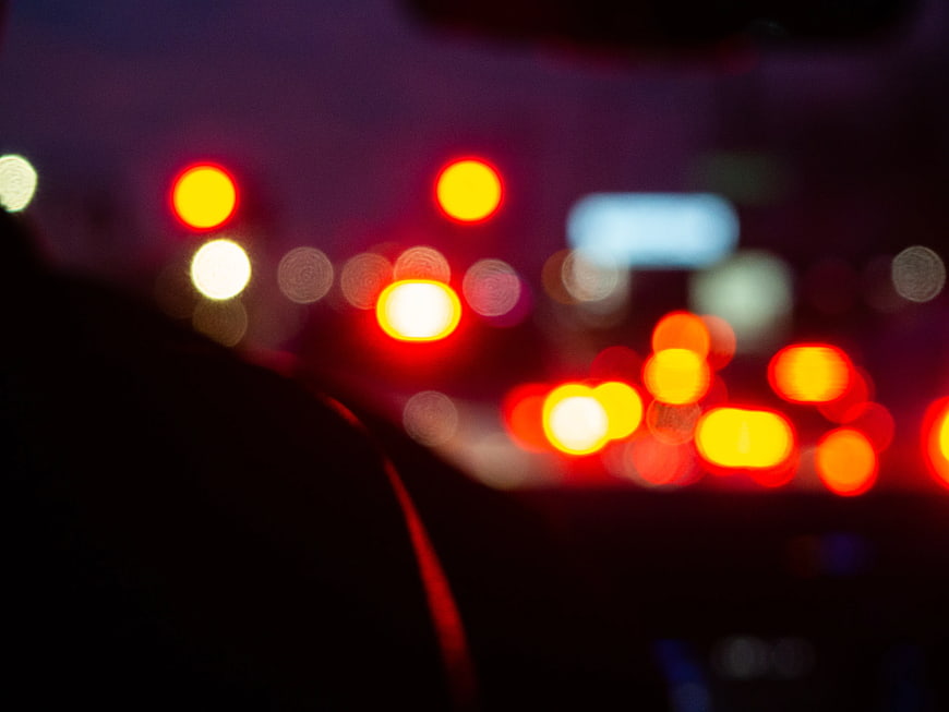 Abstract Bokeh of Blurred Car Lights at Night