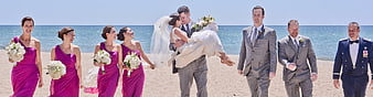 Beach Wedding Party Walking Along Shoreline