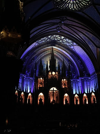 Gothic Cathedral Interior with Blue and Gold Lighting