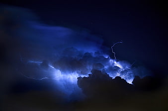 Dramatic Blue Lightning Storm in Dark Night Sky