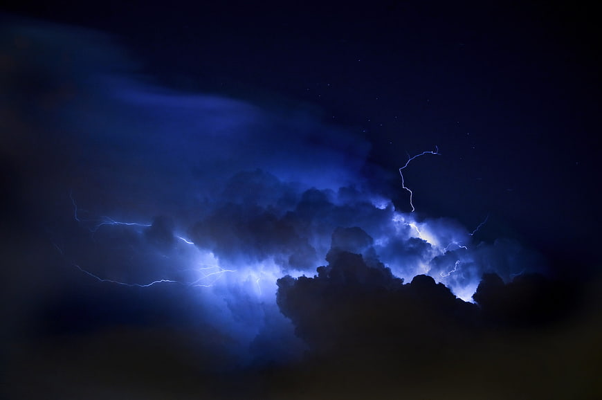 Dramatic Blue Lightning Storm in Dark Night Sky