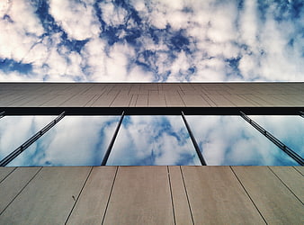 Modern Architecture with Sky Reflection in Glass Windows