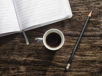 Top View Coffee Cup Notebook Pencil On Rustic Wooden Desk