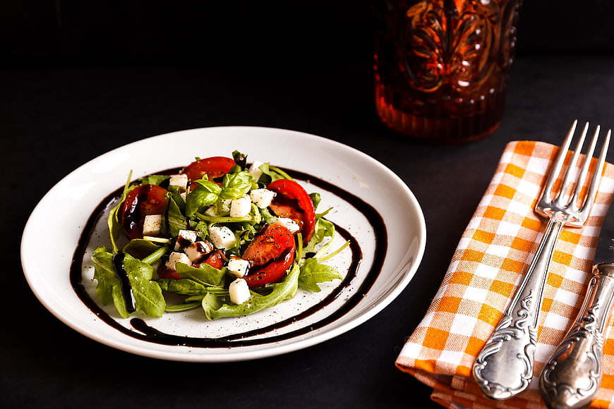 Caprese Salad with Balsamic Glaze on White Plate