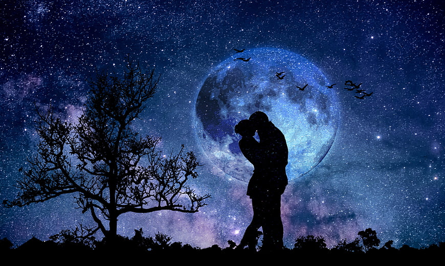 Romantic Couple Silhouette Under Giant Moon and Starry Sky