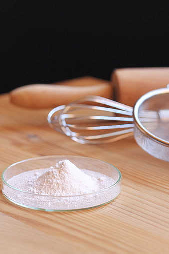 Baking ingredients and utensils on wooden table