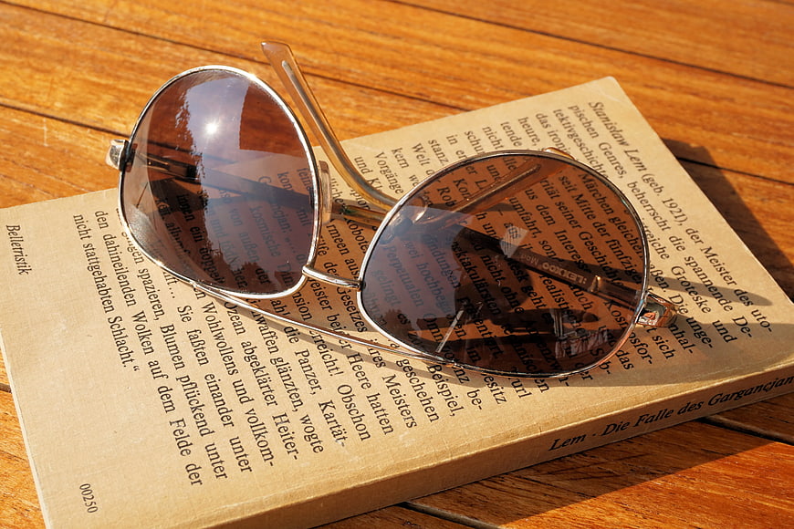 Silver Aviator Sunglasses on Vintage Book