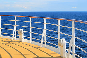 Cruise Ship Deck Railing View Over Deep Blue Ocean Horizon