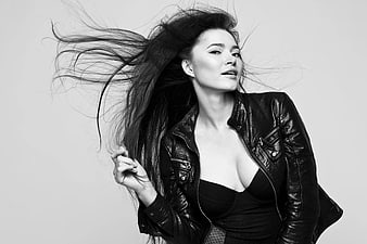Dynamic Black and White Portrait of Woman in Leather Jacket