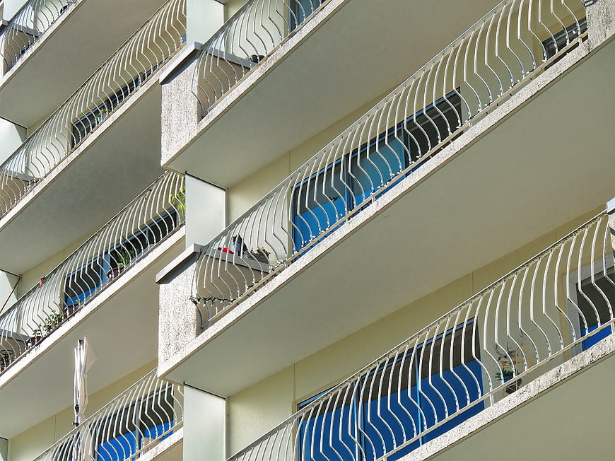 Modern Apartment Building with Wavy Balcony Railings