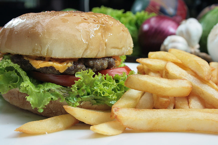 Cheeseburger with fries and fresh ingredients