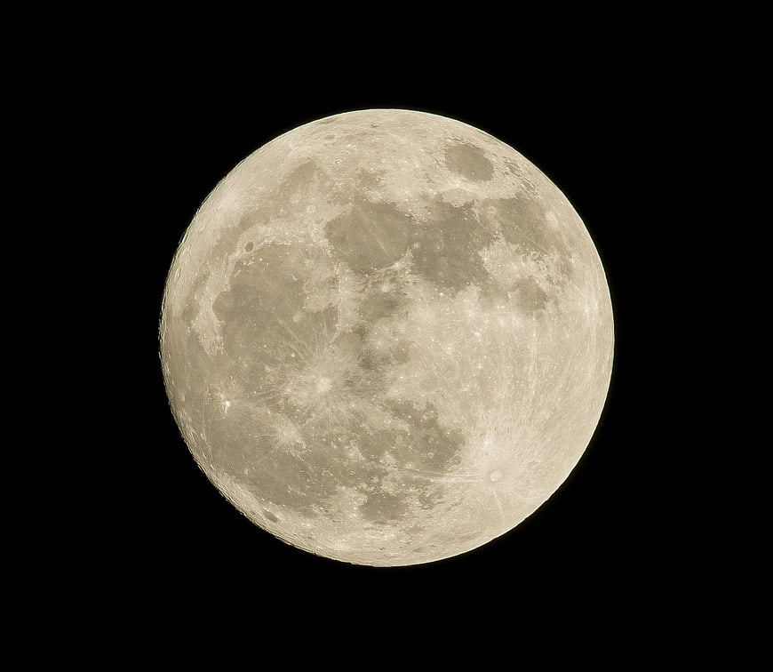 High-Resolution Full Moon Close-Up Against Black Sky