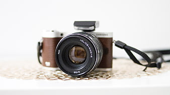 Vintage Helios Lens on Retro Camera with Lace Background