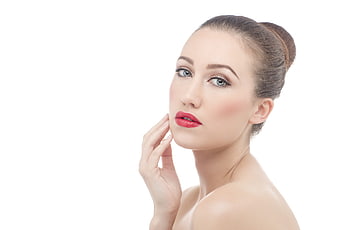Beautiful Woman with Red Lips and Smooth Skin on White