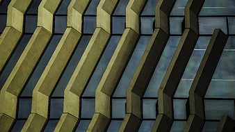 Modern Geometric Building Facade with Diagonal Concrete Beams