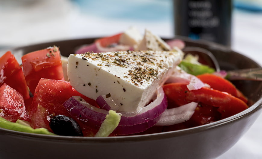 Close-up of fresh Greek salad with feta cheese and tomatoes