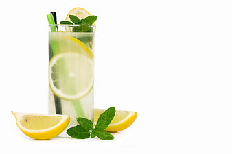 Refreshing Lemon Mint Infused Water in Glass with Fresh Citrus Slices