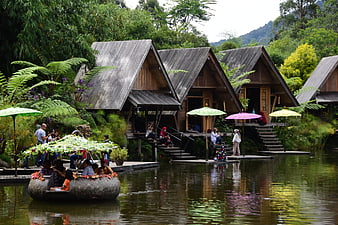 Tourists on Flower Boat at Bamboo Lake Resort