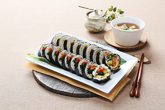 Korean Gimbap Rolls with Soup and Chopsticks