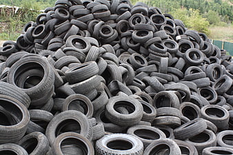 Large pile of used car tires for recycling