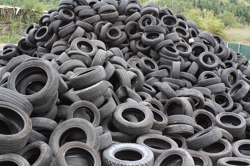 Large pile of used car tires for recycling