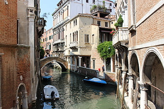 Venetian canal with historic architecture and boats