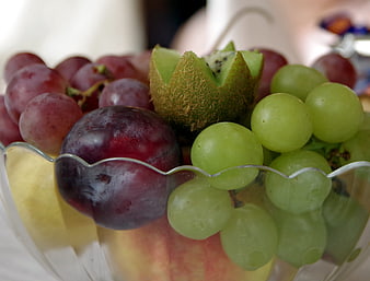 Fresh Fruit Bowl with Grapes, Plum, and Kiwi
