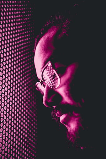 Man with Glasses in Pink Neon Light