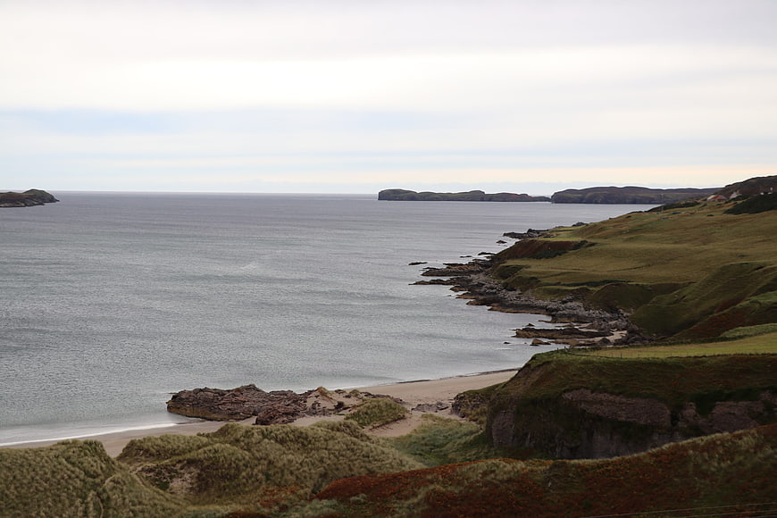 Scenic Scottish Highlands Coastline with Sandy Beach and Ocean