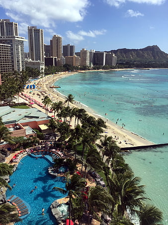 Aerial view of Waikiki Beach with Diamond Head and hotel pool