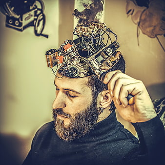Man with mechanical brain concept and smoke