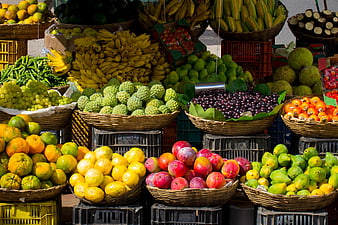 Colorful Fresh Fruit Display at Outdoor Market Stall
