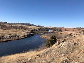 Winding River Through Arid Rocky Landscape