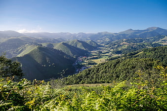 Panoramic View of Green Mountain Valley with Village