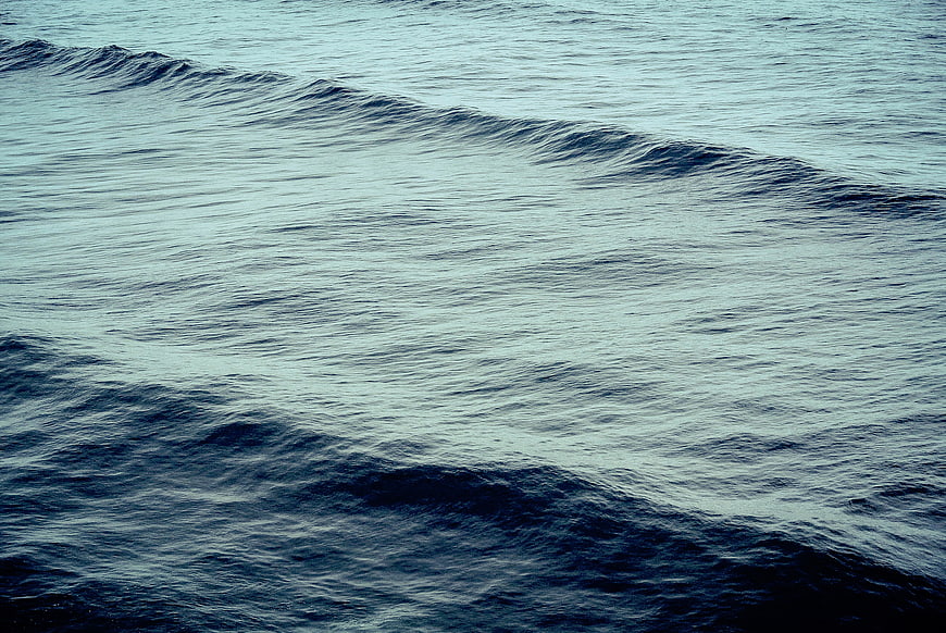 Dark Blue Ocean Waves Rolling on the Sea Surface