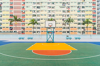 Colorful Basketball Court in Front of Public Housing