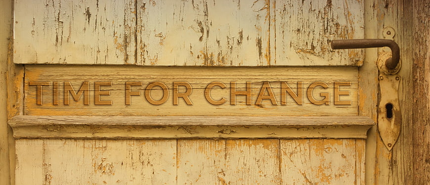 Time For Change Carved On Old Rustic Wooden Door