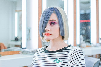 Woman with Blue and Blonde Bob Haircut in Salon
