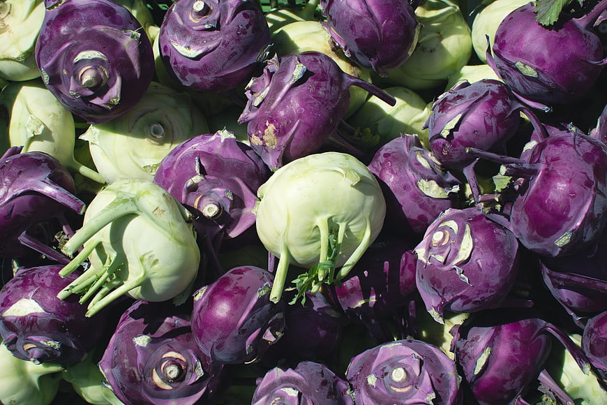 Fresh Purple and White Kohlrabi Vegetables Pile