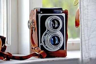 Vintage Ricoh Twin Lens Reflex Camera on Window Sill