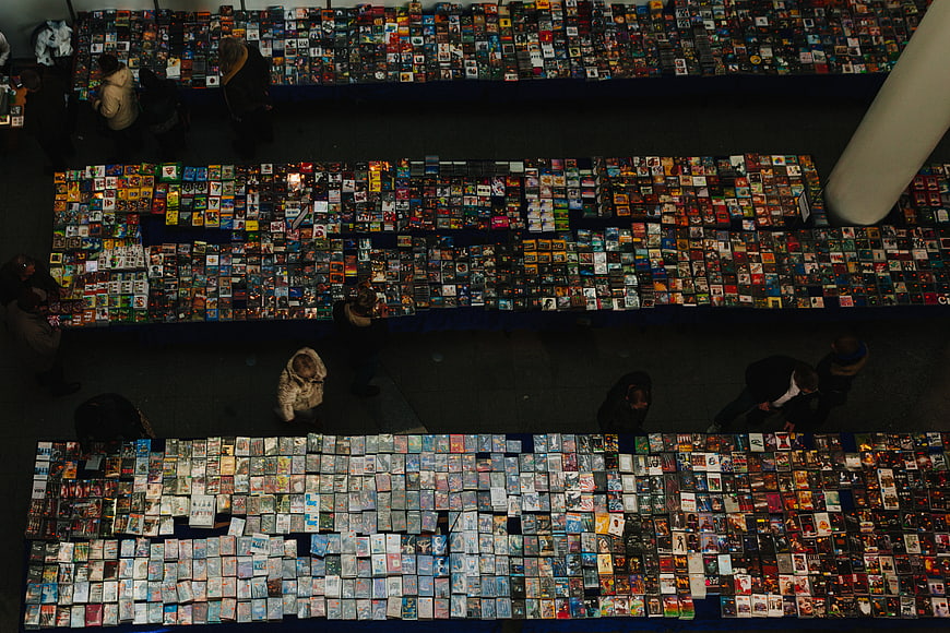 Overhead view of crowded media market with CDs and DVDs